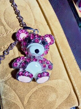 Pink Crystal Teddy Bear Pendant with 20” silver-toned Necklace.